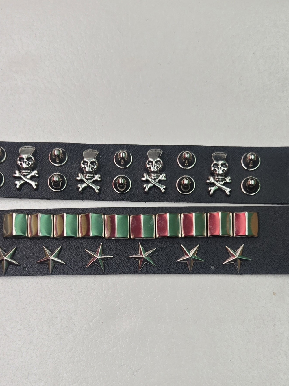 black Feaux leather punk rock bracelets  studs, star accents, and skull